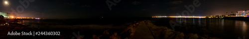 Obraz na płótnie Cyprus, Paphos, night city panorama lights, coastline and sea w salonie