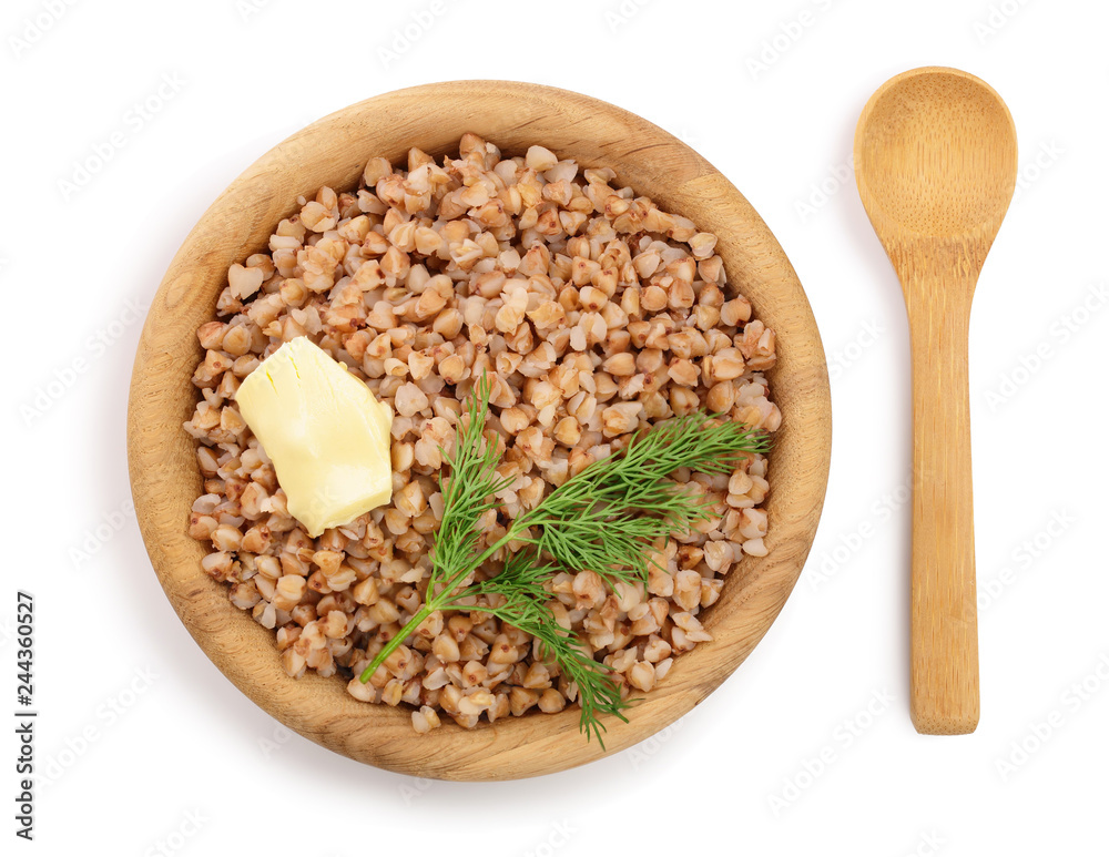 Buckwheat porridge in wooden bowl isolated on white background. Top view Buckwheat porridge in wooden bowl isolated on white background. Top view