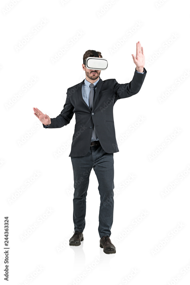 Gesturing businessman in vr glasses Gesturing businessman in vr glasses
