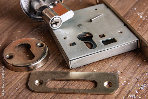 Part of aluminium door locks set. Assembly of aluminium door lock for repair.
