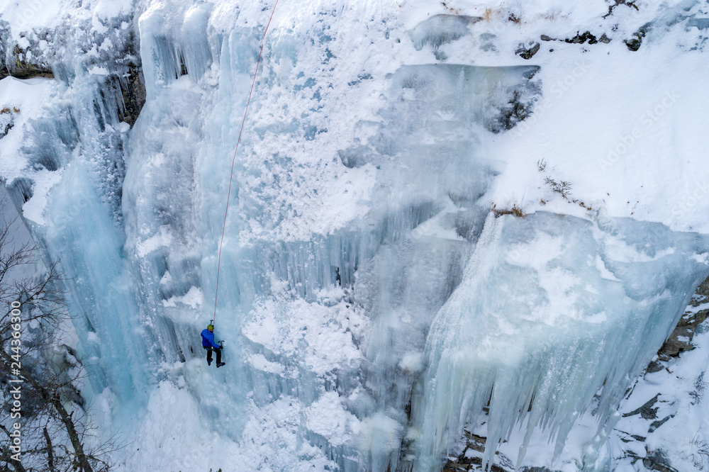 custom made wallpaper toronto digitalIce climbing the North Greece, man climbing frozen waterfall.