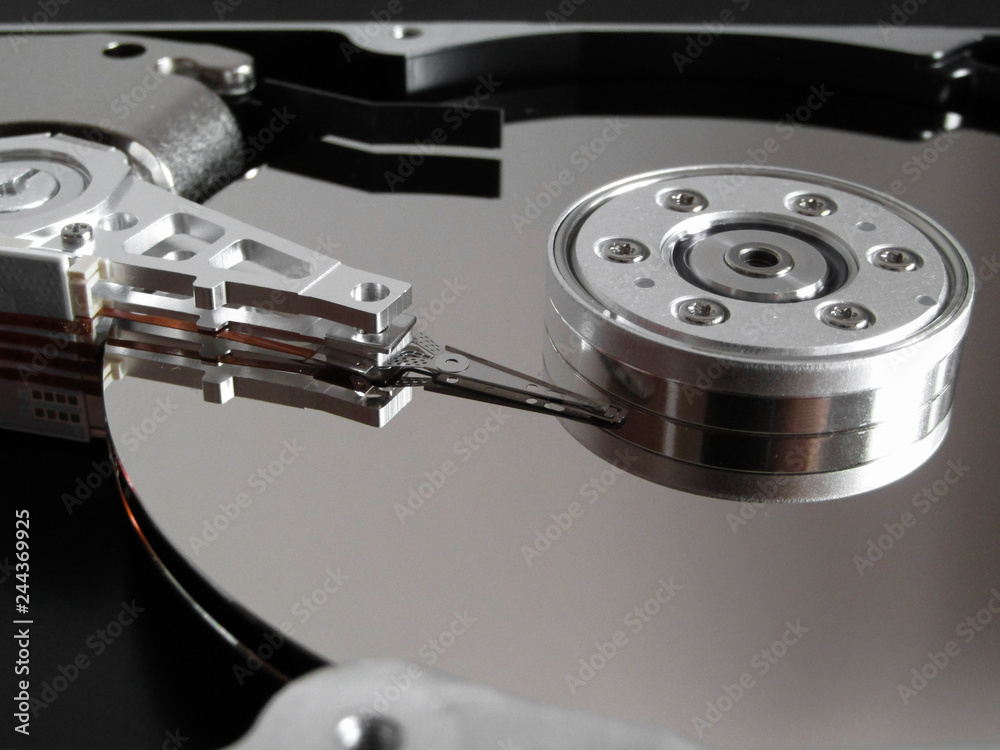 Detail from an opened hard disk Detail from an opened hard disk