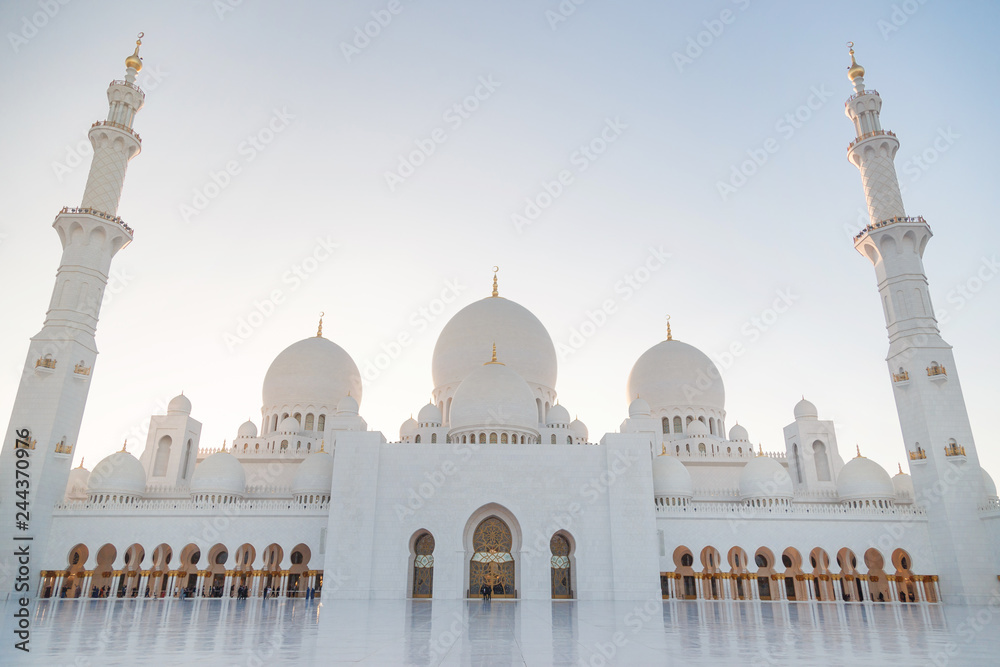 Grand Mosque in Abu Dhabi in the evening. Panorama of exterior of Sheikh Zayed Mosque.