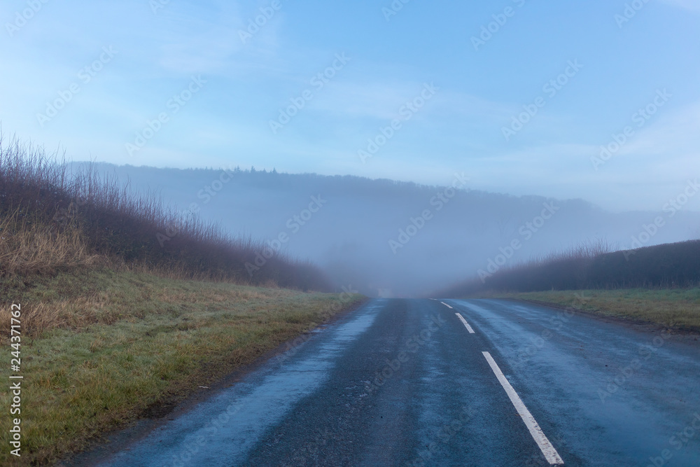 Misty road leading to anywhere