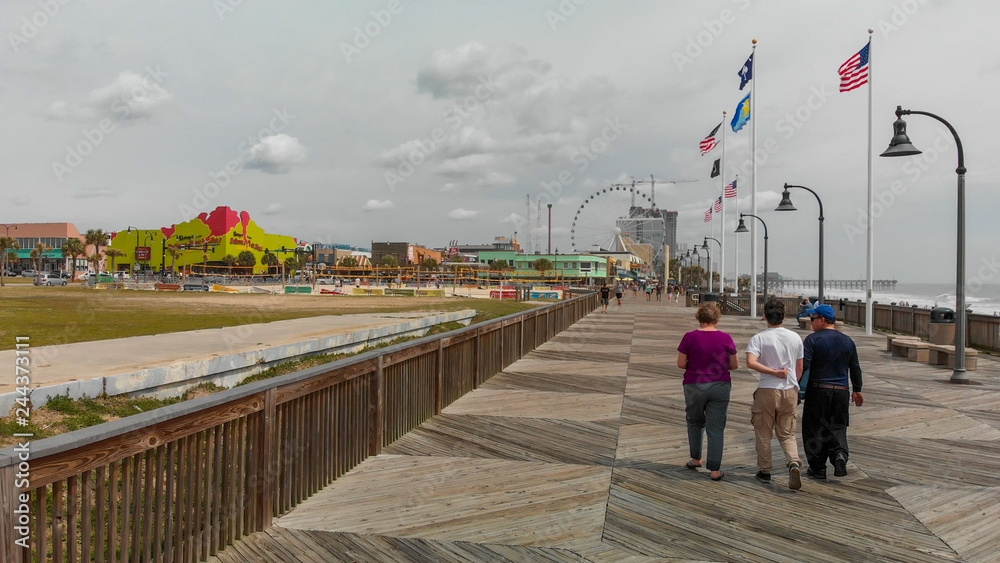 MYRTLE BEACH, SC - APRIL 2018: Panoramic aerial skyline and coastline on a cloudy afternoon. This is a famous tourist destination in summer MYRTLE BEACH, SC - APRIL 2018: Panoramic aerial skyline and coastline on a cloudy afternoon. This is a famous tourist destination in summer