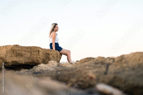 Young girl looking the sea