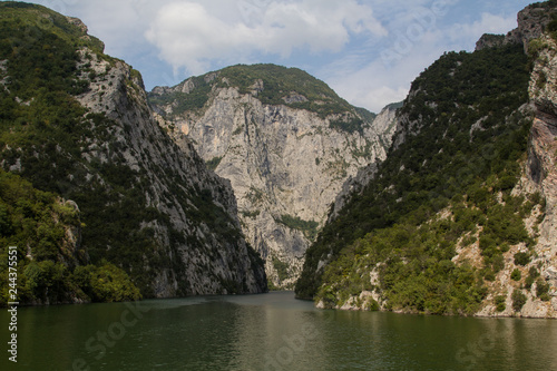 The steep mountain cliffs on the ferry on the beautiful and idyllic Koman lake in northern Albania © Jürgen Barth
