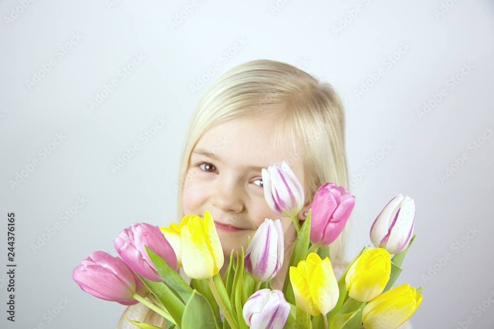 Child with a bouquet of colorful flowers Child with a bouquet of colorful flowers