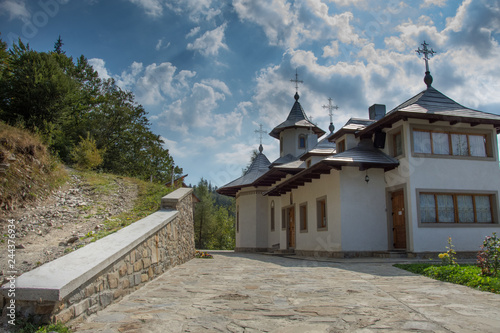 road through the forest to the  Monastery St. John Iacob , Suceava , Romania,2017 photo