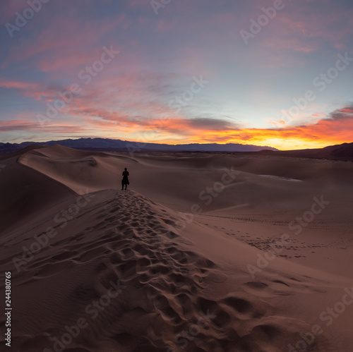 The Hiker at Sand Dune during Sunset at Death Valley National Park