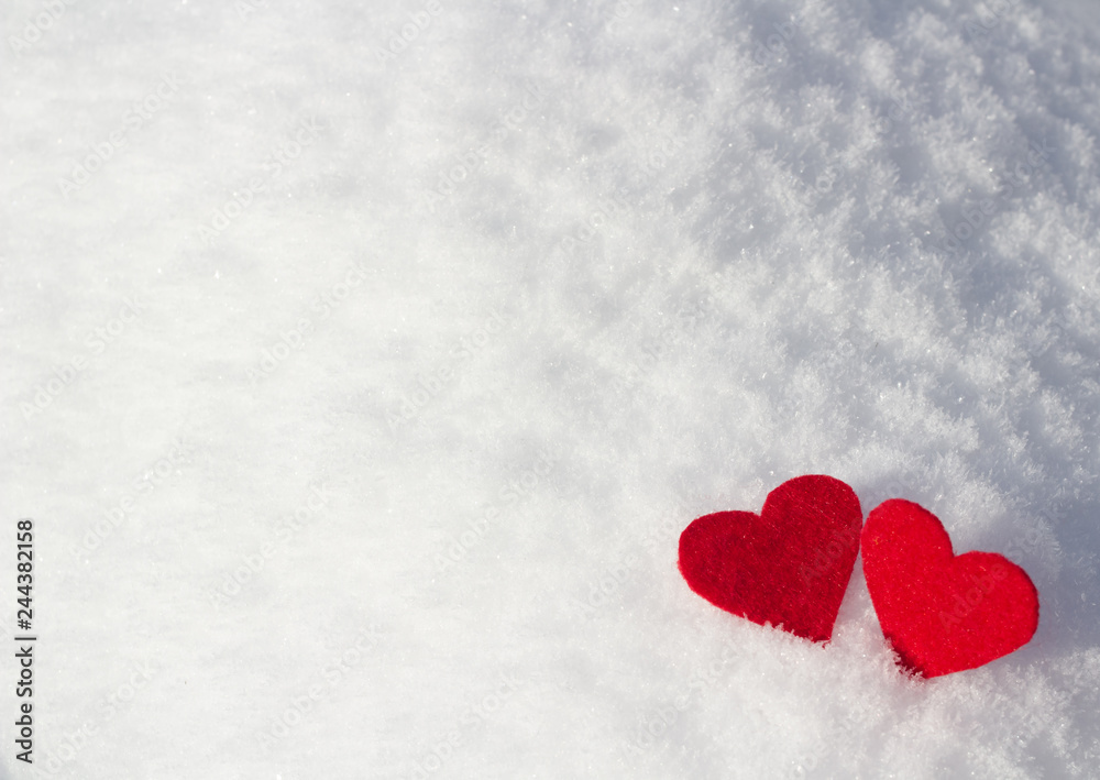 red valentines on a background of fluffy white blue snow red valentines on a background of fluffy white blue snow