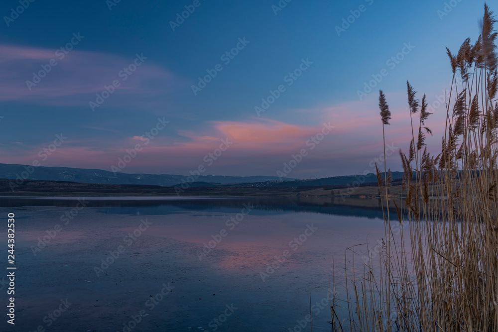 Milada lake in winter cold evening in north Bohemia