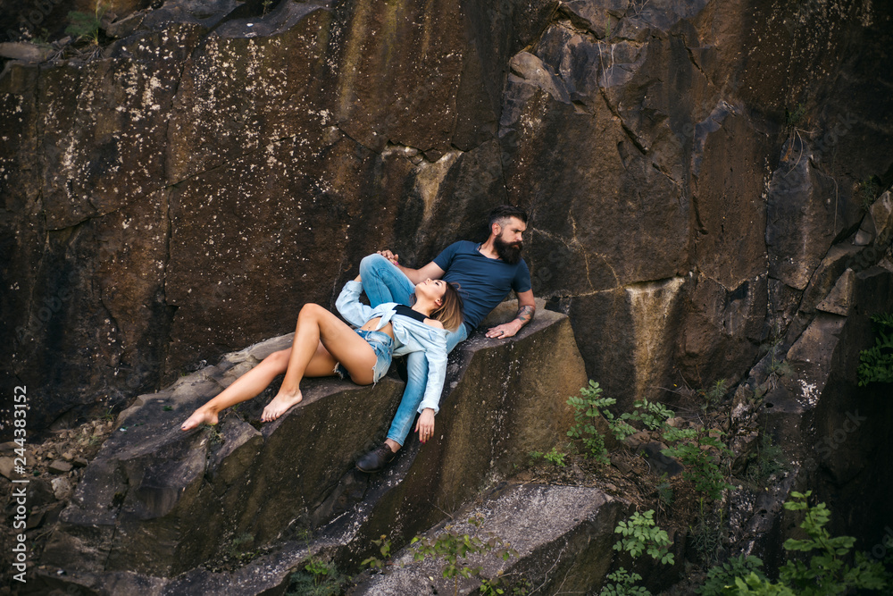 Leave all your worries behind. Sexy woman and bearded man on natural landscape. Couple enjoy love and romance. Couple in love on summer vacation. Sensual couple on vacation trip