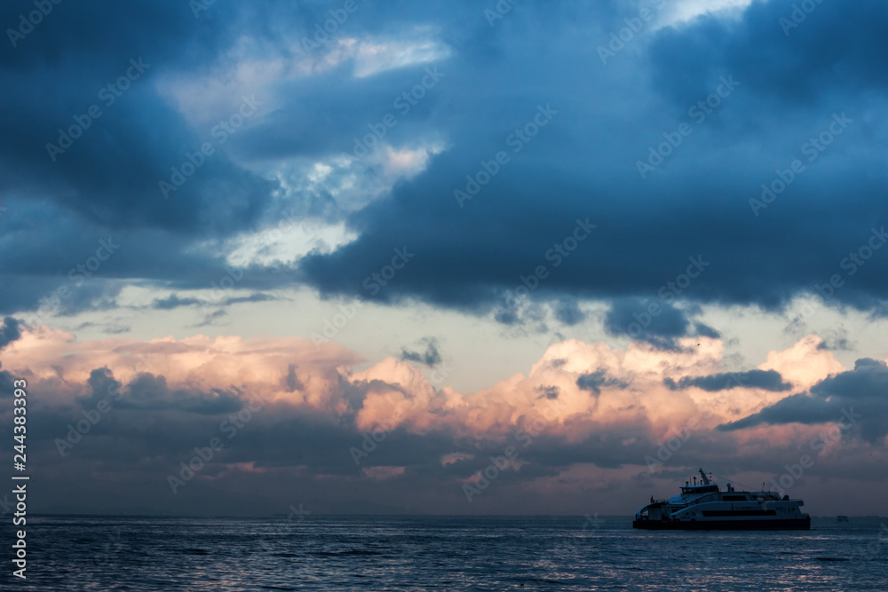 Early morning, in a stormy early morning, on the sea of Izmir (Turkey)