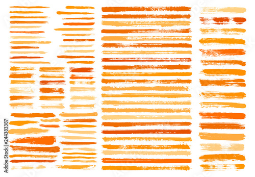 Orange paint stain brush stroke dabs set.