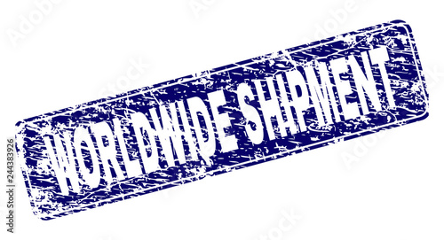 WORLDWIDE SHIPMENT stamp seal print with grunge texture. Seal shape is a rounded rectangle with frame. Blue vector rubber print of WORLDWIDE SHIPMENT text with dust texture.