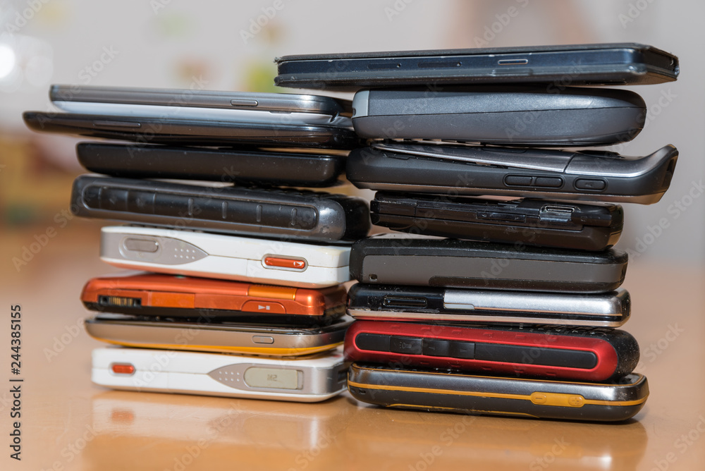 Numerous smartphones stacked Numerous smartphones stacked