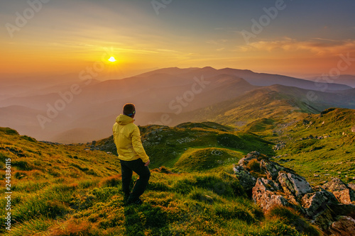 Motivating image of a man in the mountains.