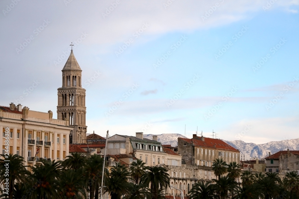 Historical building on Riva Promenade in Split, Croatia with Saint Domnius bell tower, landmark in Split. 