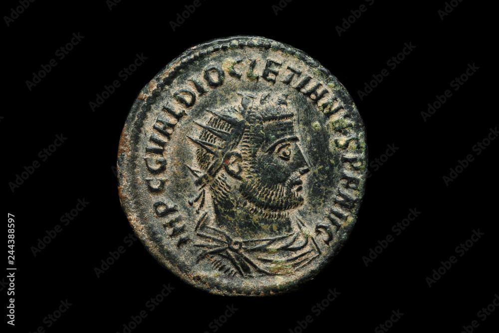Ancient copper or bronze coin isolated on black, closeup Ancient copper or bronze coin isolated on black, closeup