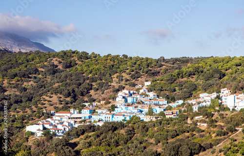 Village of white houses in the Sierra de Malaga, in Spain, on a sunny day. © Tomas