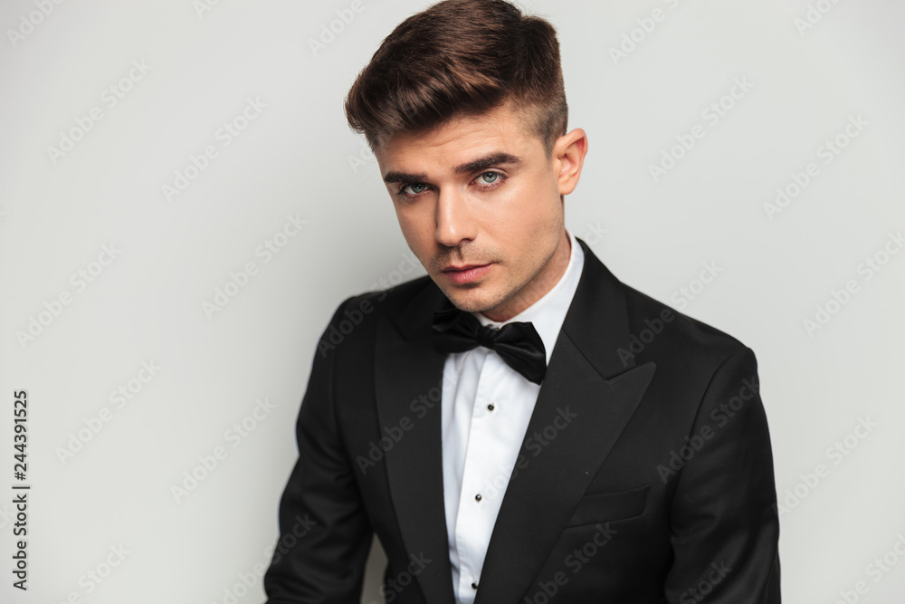 portrait of young and handsome groom standing portrait of young and handsome groom standing