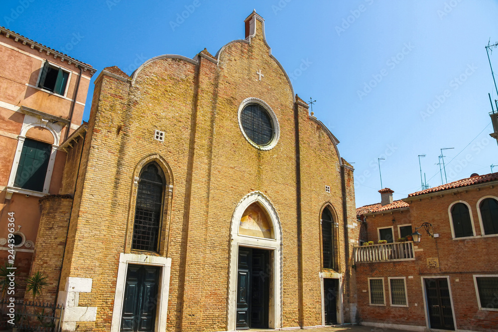 View on a historic church in Venice, Italy on a sunny day.