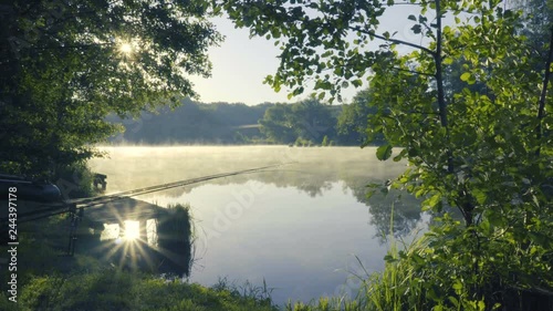 Fog on river at sunrise