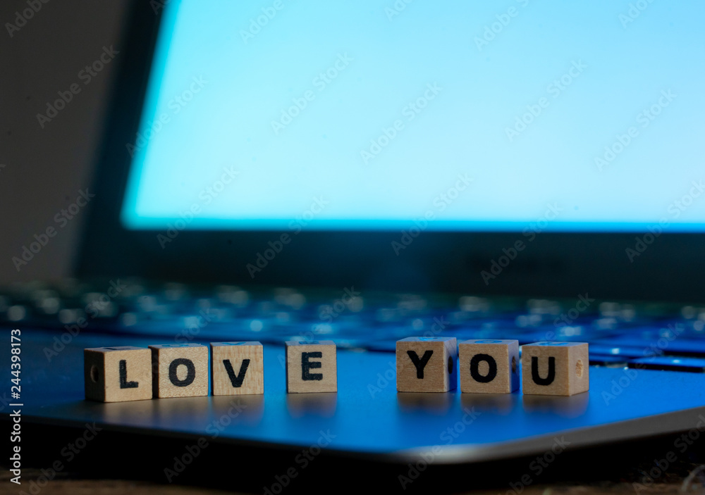 Close up of laptop and love message in stay connected, online dating or shopping for Valentines day