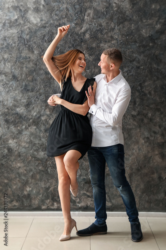 Beautiful couple dancing ne...