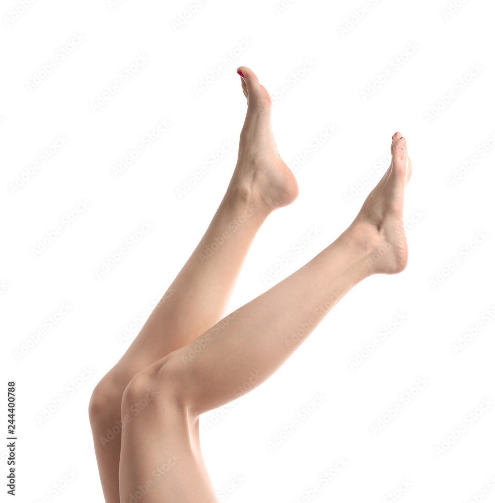 Female legs with beautiful pedicure on white background Female legs with beautiful pedicure on white background