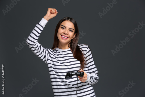 Beautiful happy woman playi...