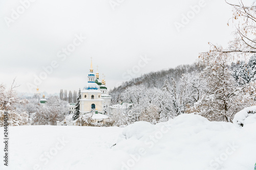 orthodox church in winter covered with snow