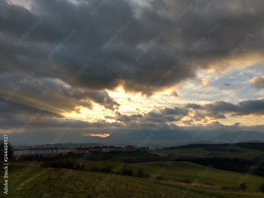 Sunset and sunrise with dramatic colorful clouds. Slovakia	