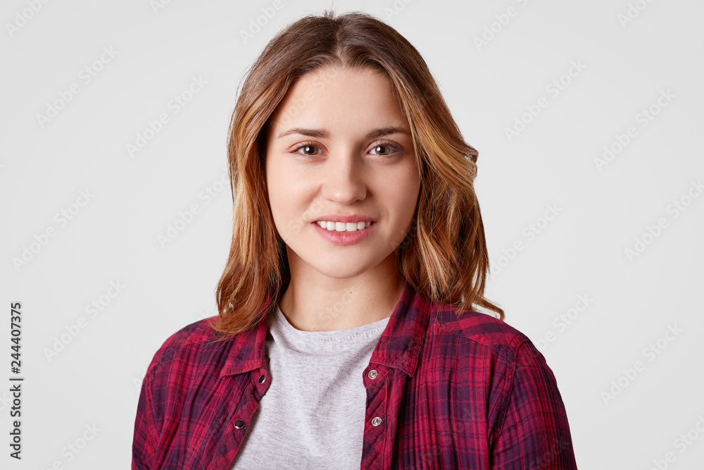Portrait of happy European woman with dyed hair, being in good mood, rejoices day off, dressed in fashionable clothes, isolated over white background. Positive emotions and feelings concept. Portrait of happy European woman with dyed hair, being in good mood, rejoices day off, dressed in fashionable clothes, isolated over white background. Positive emotions and feelings concept.