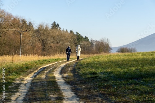 People walking on a meadow during sunset. Slovakia  © Valeria