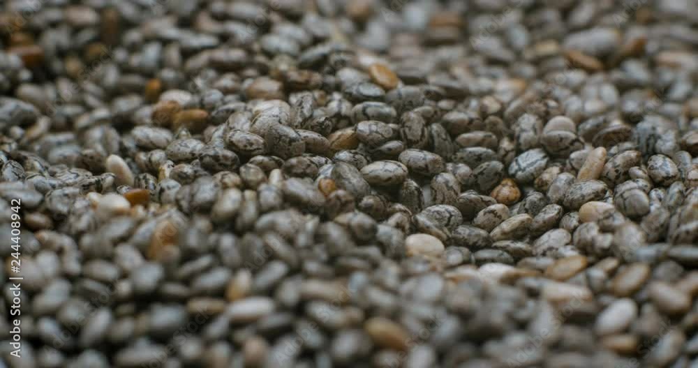 Chia seed falling and rotating macro studio Chia seed falling and rotating macro studio