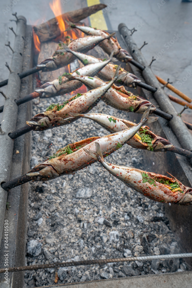 mackerel, cooking on the grill, city holiday. mackerel, cooking on the grill, city holiday.