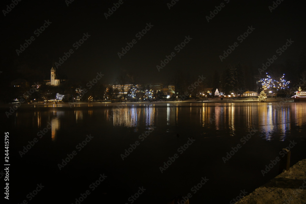 Romantic and Tranquil Scene Reflections on the Water of Bled Lake in a Cold Winter with White Snow and Nobody