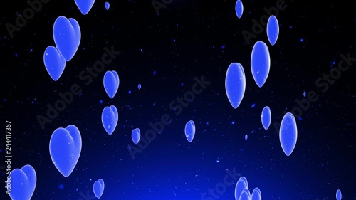 Blue colored Valentine's Day Heart shapes on artistic dark motion background. 