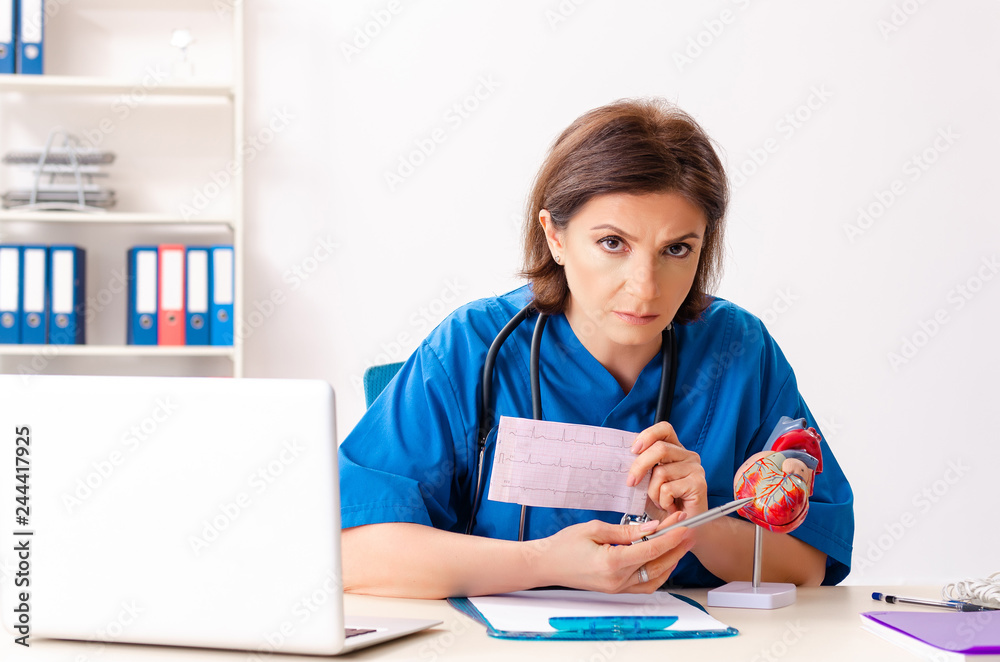 Female doctor cardiologist working in the hospital Female doctor cardiologist working in the hospital