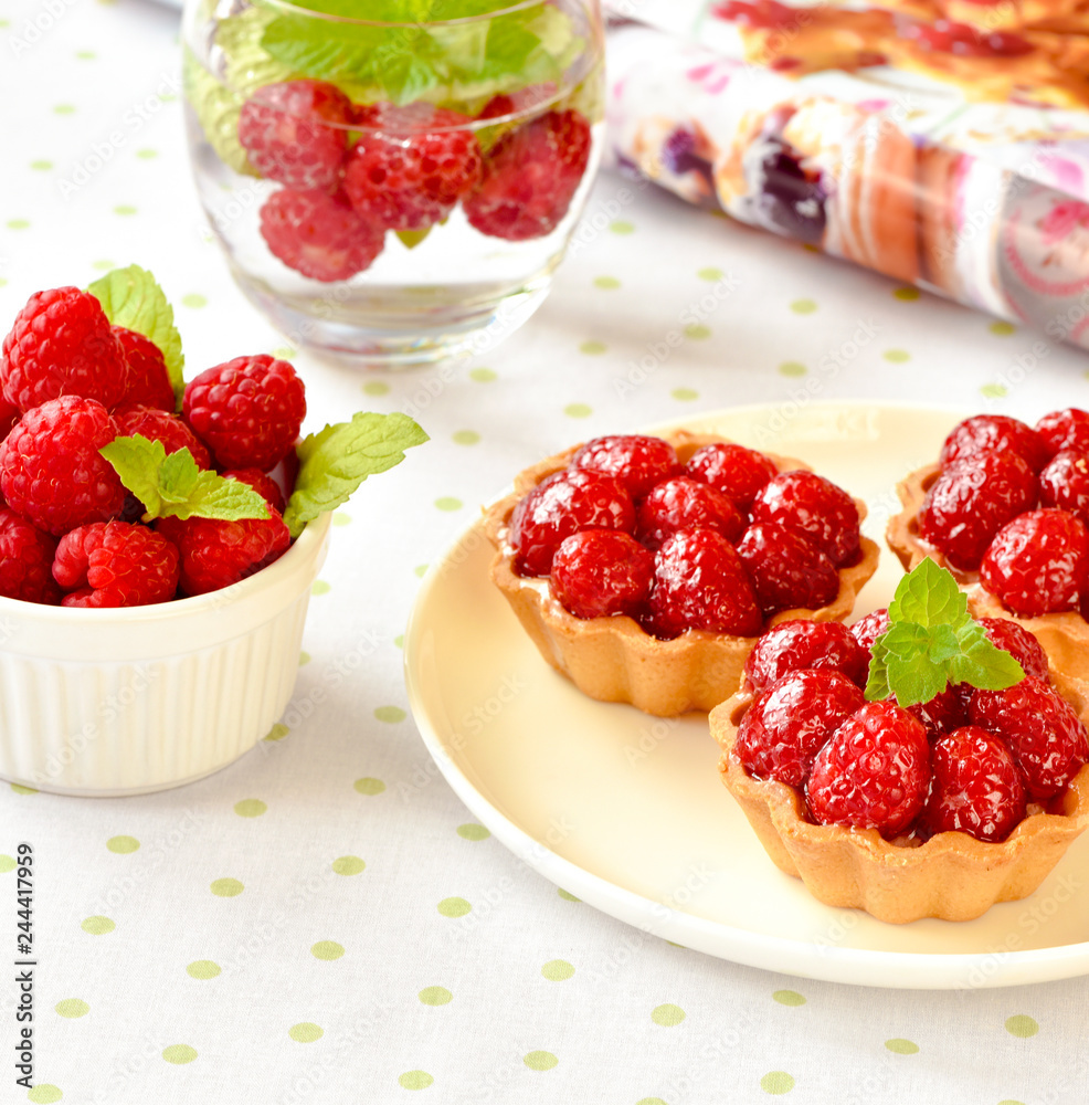 Homemade mini tarts with raspberries fruits Homemade mini tarts with raspberries fruits