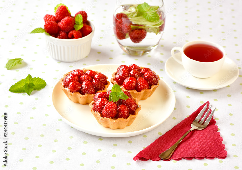 Homemade mini tarts with raspberries fruits Homemade mini tarts with raspberries fruits