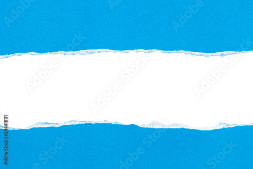 Blue ripped open paper on white paper background