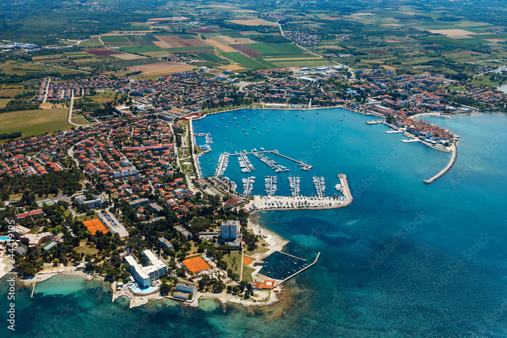 Naklejka premium Old coastal city Umag in Croatia, aerial view. Istria, Europe.