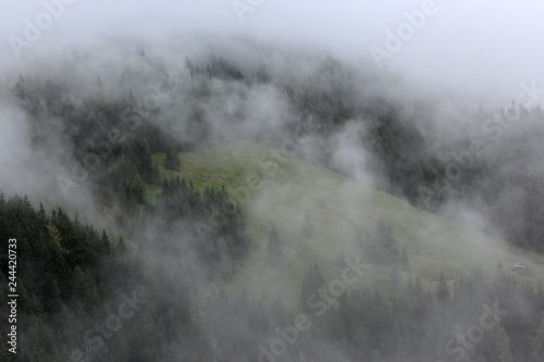 Rolling clouds over mountain