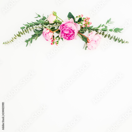 Floral frame with pink peonies and roses flowers and eucalyptus on white background. Flat lay, top view © artifirsov