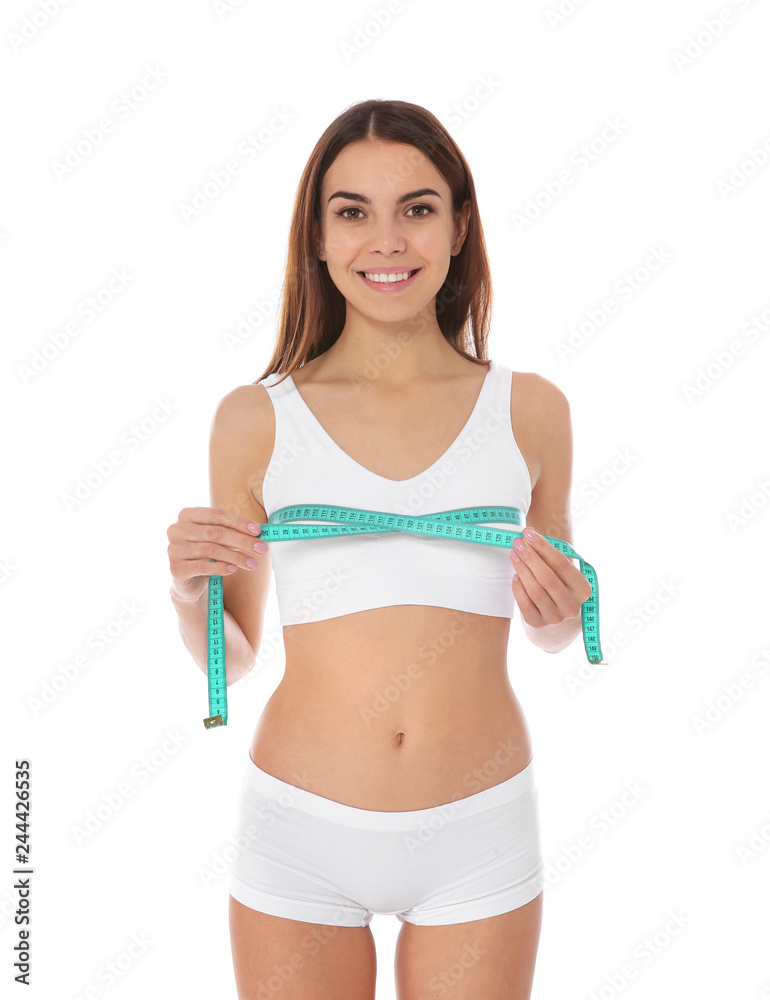 Slim woman measuring her chest on white background. Weight loss Slim woman measuring her chest on white background. Weight loss