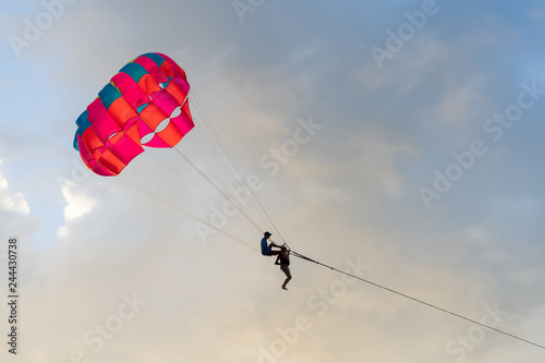 Evening parasailing on the beach of Patong, Phuket province, Kingdom of Thailand