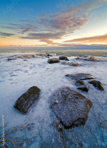Sunset over Beach in Winter and snow